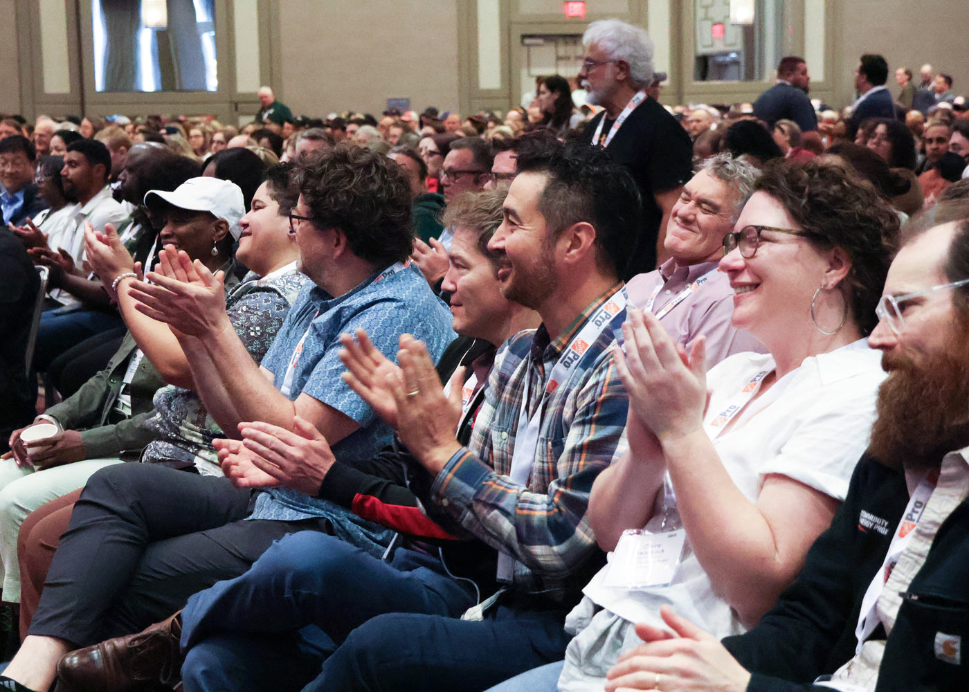 Group of people clapping art an event